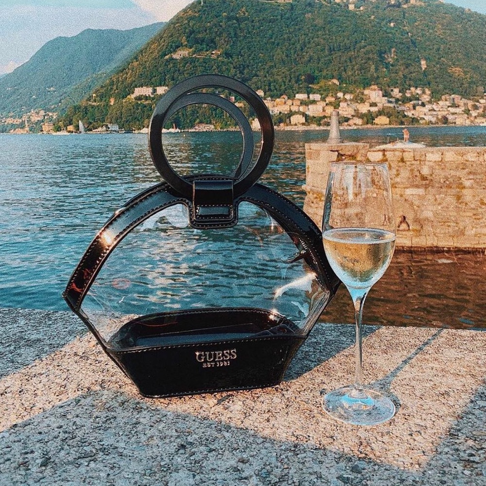 Lovely Guess clear bag and black cosmetics bag